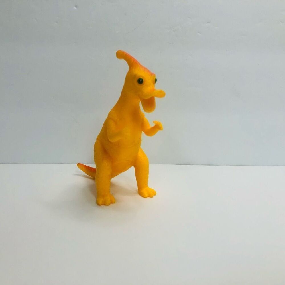 dinosaur yellow toy figure hard rubber 4 inch tall prehistoric educational toy